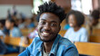 © Keitma - Portrait of an black afro american happy university student sitting in a college lecture hall