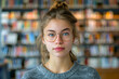 © smth.design - Confident Young Woman in Library with Glasses