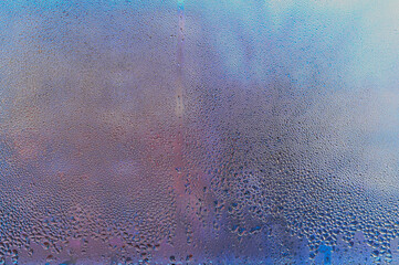 Wall Mural - background of wet glass with water droplets