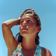 Portrait of a young woman on a hot day in summer