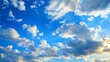 Clouds part to unveil a brilliant blue sky