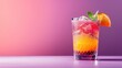 Colorful cocktail with orange and mint garnish against a purple background