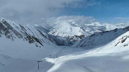 Wall Mural - Kazbek,Kudebi, Bidara, Sadzele, Kobi aerial panorama in caucasus winter mountains. Aerial drone view of Gudauri ski resort in winter. Caucasus mountains in Georgia from drone. Freeride in Gudauri.