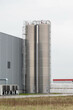plastic silos near factory building
