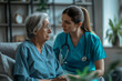 A middle-aged nurse offers support and assistance to an elderly woman, helping her with daily tasks and medical needs.