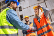 © Mediteraneo - Contractor. construction worker team hands shaking after plan project contract  at construction site, contractor, engineering, partnership, construction concept
