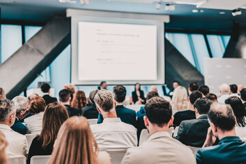 Wall Mural - Round table discussion at business conference meeting event.. Audience at the conference hall. Business and entrepreneurship symposium