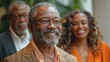 Smiling Older Black Man at Office Party for Retirement Promotion Event