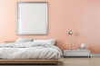 A serene, Scandinavian-style bedroom with a soft peach wall and a matte silver frame mockup poster. The room features a low, platform bed, crisp white bedding, and a sleek, moder
