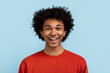 © Prostock-studio - Cheerful young black man smiling at camera