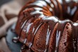 Chocolate bundt cake with glaze focused on