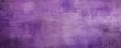 Purple barely noticeable color on grunge texture cement background pattern with copy space 