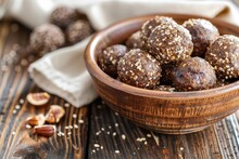 Brown Bowl With Energy Balls White Towel Fruits Nuts Flour Honey Sesame On Wooden Background