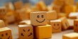 A stack of wooden blocks with a smiling face on top