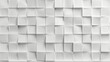© Irina.Pl - Three-dimensional white cube pattern on textured wall. Optical illusion created by white square tiles. Modern and creative white geometric wall design.