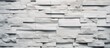 Detailed view of a wall constructed with immaculate white marble blocks, creating a clean and elegant aesthetic