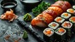 Set of sushi and rolls on a dark stone background. Food advertising. Banner, menu.