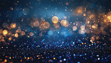 Fototapeta  - background of abstract glitter lights. blue, gold and black. A close-up view of a blue and gold background with stars. Suitable for celestial, festive, or glamorous designs.