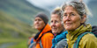 © aamulya - Active Mature senior people hiking in the mountains, banner