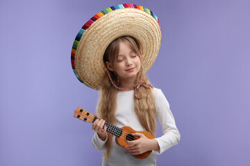 Wall Mural - Cute girl in Mexican sombrero hat playing ukulele on purple background