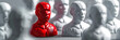 The unique red figurine stands out from the crowd of white, symbolizing ambition, success, and the confidence to rise above competition and shine as a leader and winner