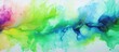 Colorful vibrant rainbow liquid paint splattered on a plain white background, creating a striking and vivid display
