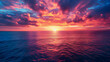 Beautiful colorful sunset over the ocean with dramatic clouds. A stunning view of an endless horizon, where red and purple hues blend in the sky, creating a breathtaking natural spectacle