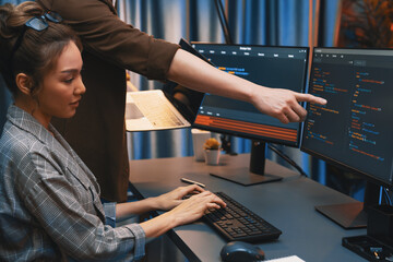 serious of it developers discussing intelligent website development coder system running data online