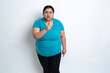 Angry Overweight indian woman pointing finger. against white background. aggressive Plus size female, Emotion, upset, rage, mad, screaming, Mental health, Copy Space