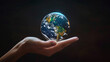 © Jirut - Levitating planet earth over female white skin beautiful hand , with subtle studio lighting enhancing its ethereal beauty