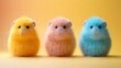  Three hamsters together against yellow-orange background, one facing camera