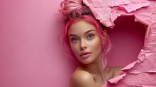   A Woman With Pink Hair And Blue Eyes Posing In A Pink Hole With Torn Paper On The Wall