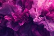   A tight shot of pink and purple fluid against a white backdrop, contrasted by a black surround