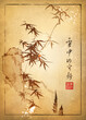 Bamboo stems among stones against the background of falling snow. Illustration in oriental style. Text - 