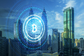 Canvas Print - Creative glowing round bitcoin hologram on blurry city background. Cryptocurrency and finance concept. Double exposure.