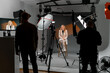 © Big Shot Theory - A woman at film studio set. Behind the scenes
