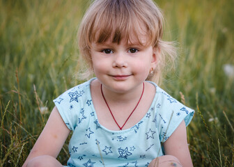 Portrait of a cute little girl in summer dress	