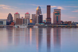 Fototapeta Paryż - Louisville, Kentucky, USA. Cityscape image of Louisville, Kentucky, USA downtown skyline with reflection of the city the Ohio River at spring sunrise.