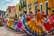 Cinco de Mayo concept - women in national dresses dancing during the carnival fiesta