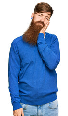 Poster - Young irish redhead man wearing casual clothes thinking looking tired and bored with depression problems with crossed arms.