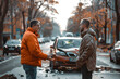 Car accident concept - men drivers discuss car crash
