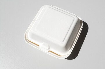 White cardboard box for bento cake to take away, highlighted on a white background