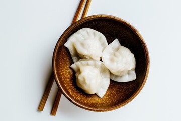 Wall Mural - dumpling dimsum on brown bowl, traditional chinese dim sum food, white background, top view