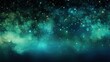 a blurry image of a green and blue background with small stars 