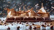 High-speed photography of a chocolate bar with a splash effect, against a plain white background.