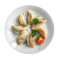 Wall Mural - A plate of dumplings with parsley and a tomato on top