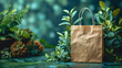 Craft paper eco bag on green background among plants.