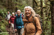 © YouAreBeautiful - seniors hiking through a forest trail