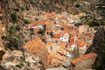 Canvas Print - View from above of the village of Ayna, Albacete, Castilla la Mancha, Spain, with its red-roofed old town