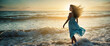 Beautiful woman relaxing and enjoying the beautiful sunset walking barefoot on the shore in a deserted beach.
